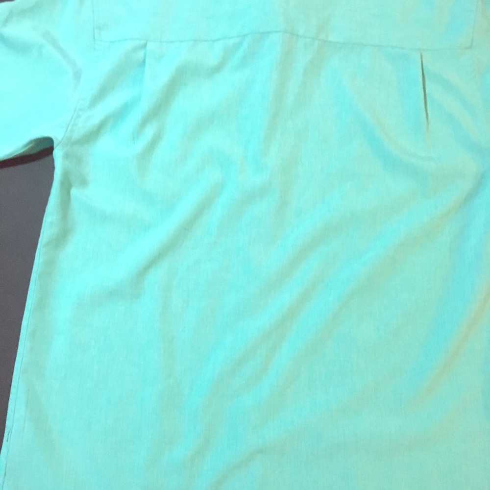 This is Café Luna mint blue button up dress shirt